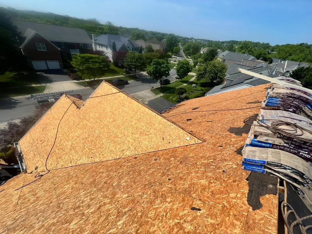 Slide of Motto's Roofing and Construction