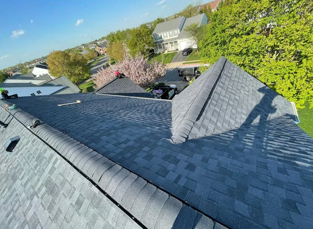 Slide of Motto's Roofing and Construction