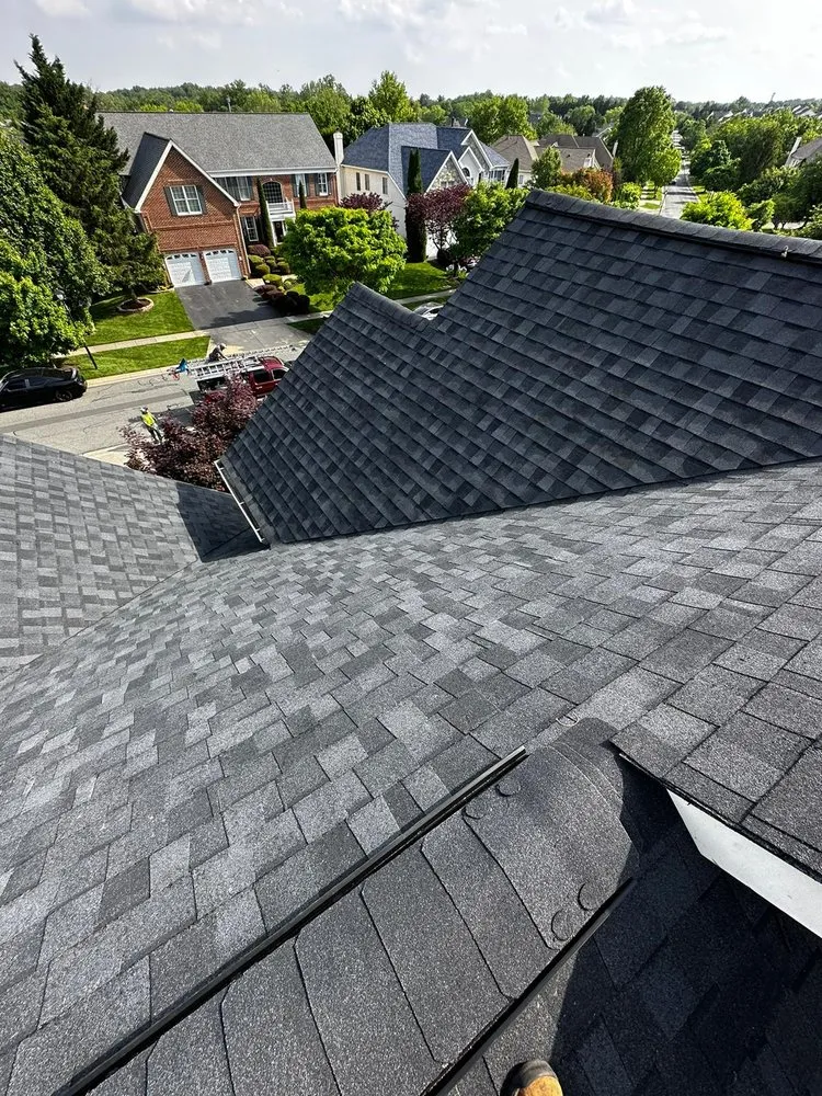 Slide of Motto's Roofing and Construction