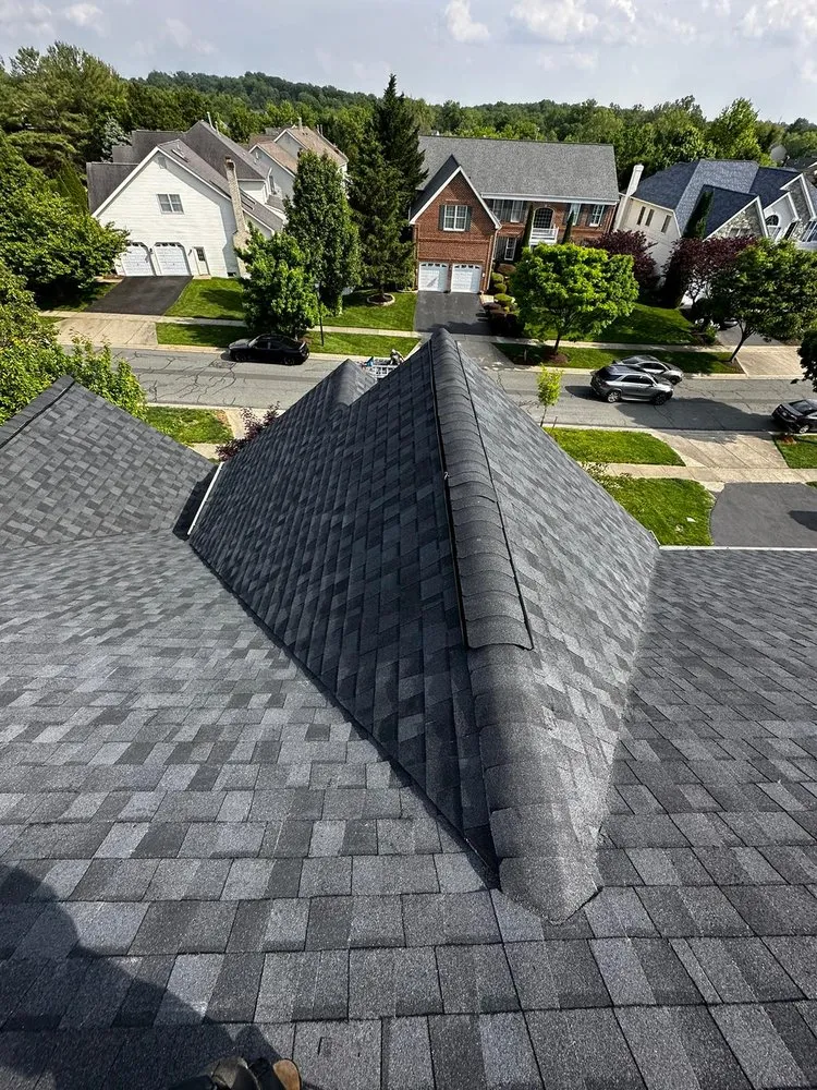 Slide of Motto's Roofing and Construction