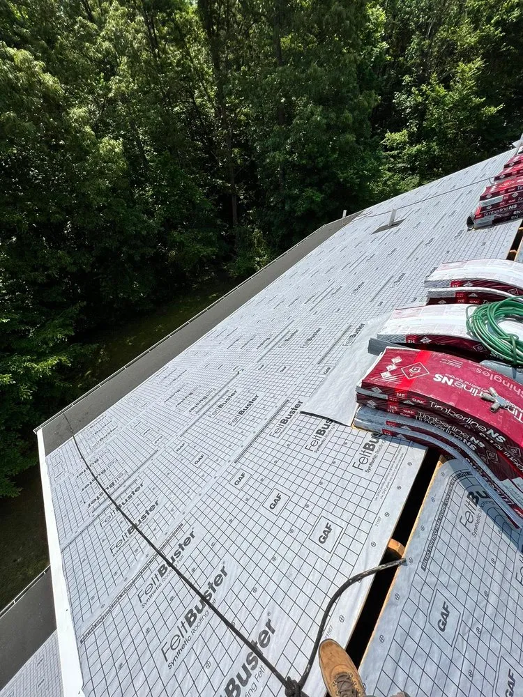 Slide of Motto's Roofing and Construction