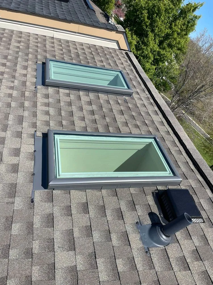 Slide of Motto's Roofing and Construction