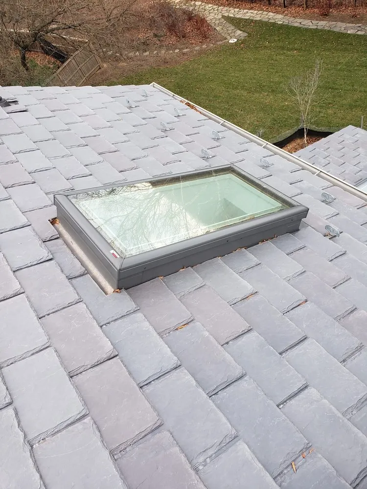 Slide of Motto's Roofing and Construction