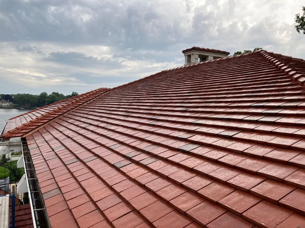 Slide of Mougin Roofing