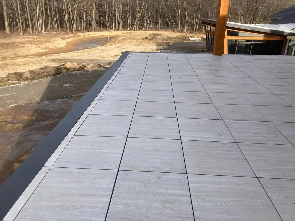 Slide of Mougin Roofing