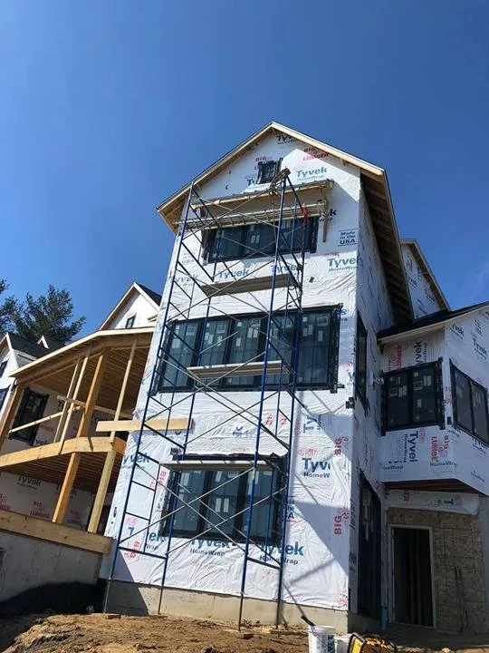 Slide of Mougin Roofing