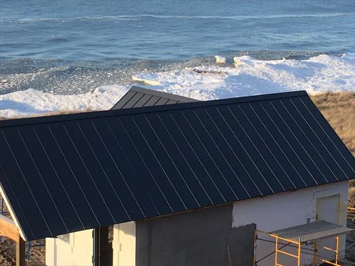 Slide of Mougin Roofing