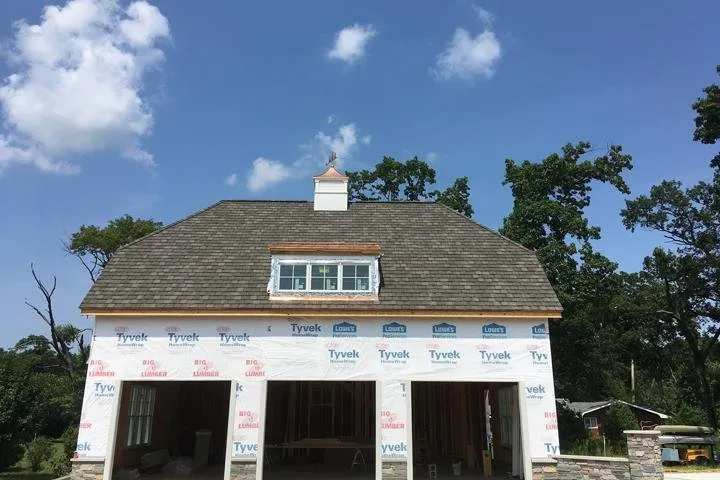 Slide of Mougin Roofing