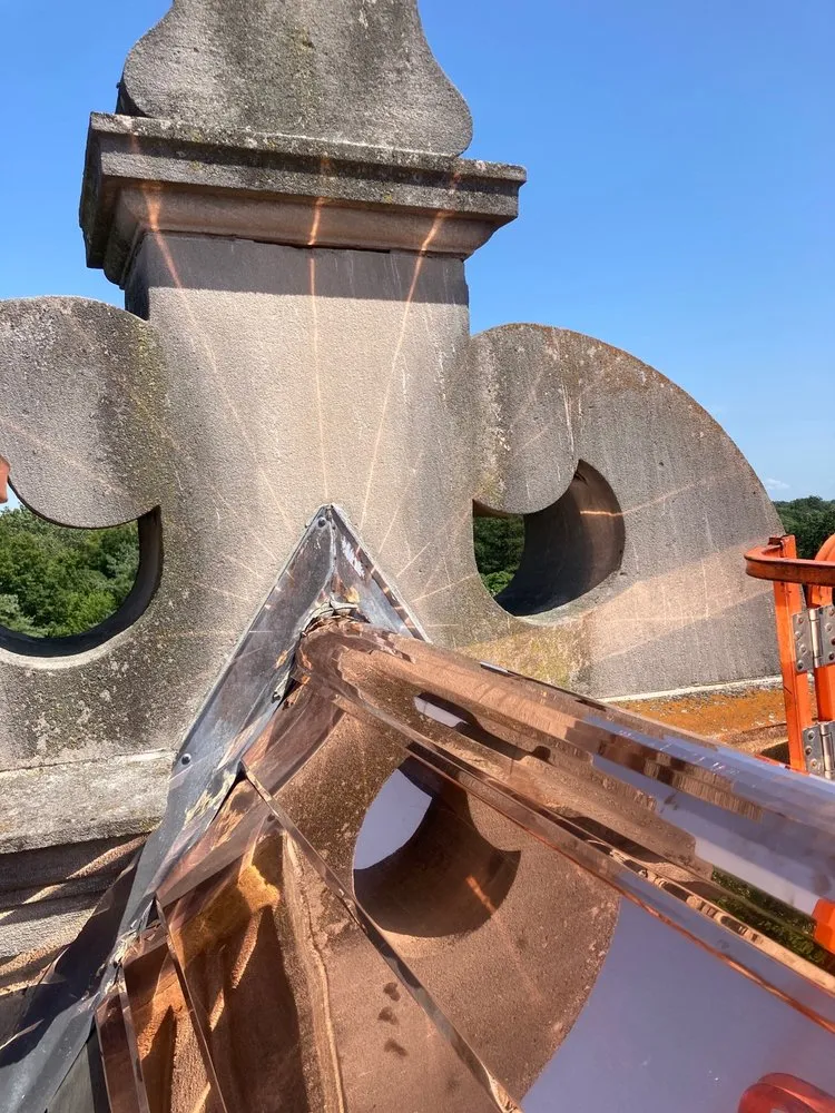 Slide of Mougin Roofing