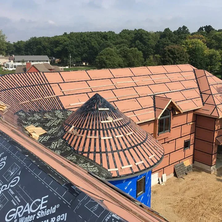 Slide of Mougin Roofing