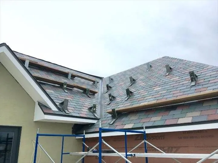 Slide of Mougin Roofing