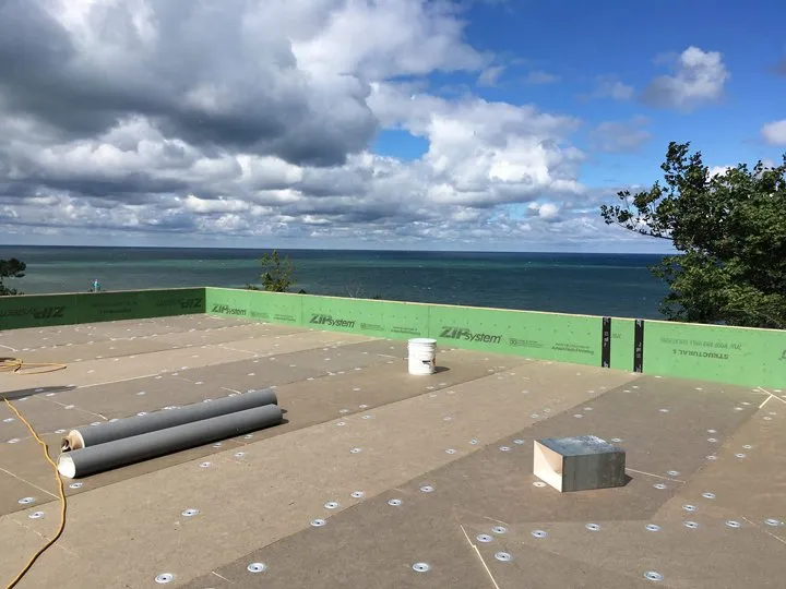 Slide of Mougin Roofing