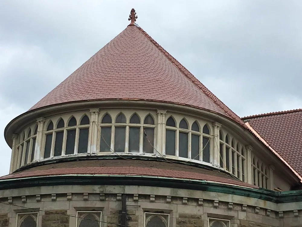 Slide of Mougin Roofing