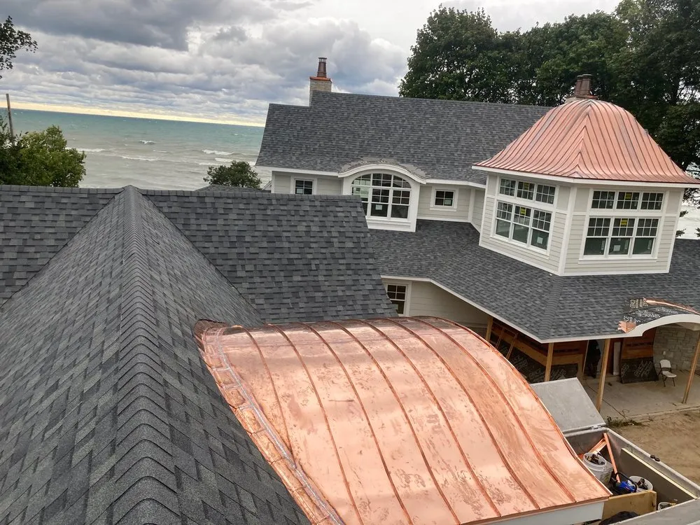 Slide of Mougin Roofing