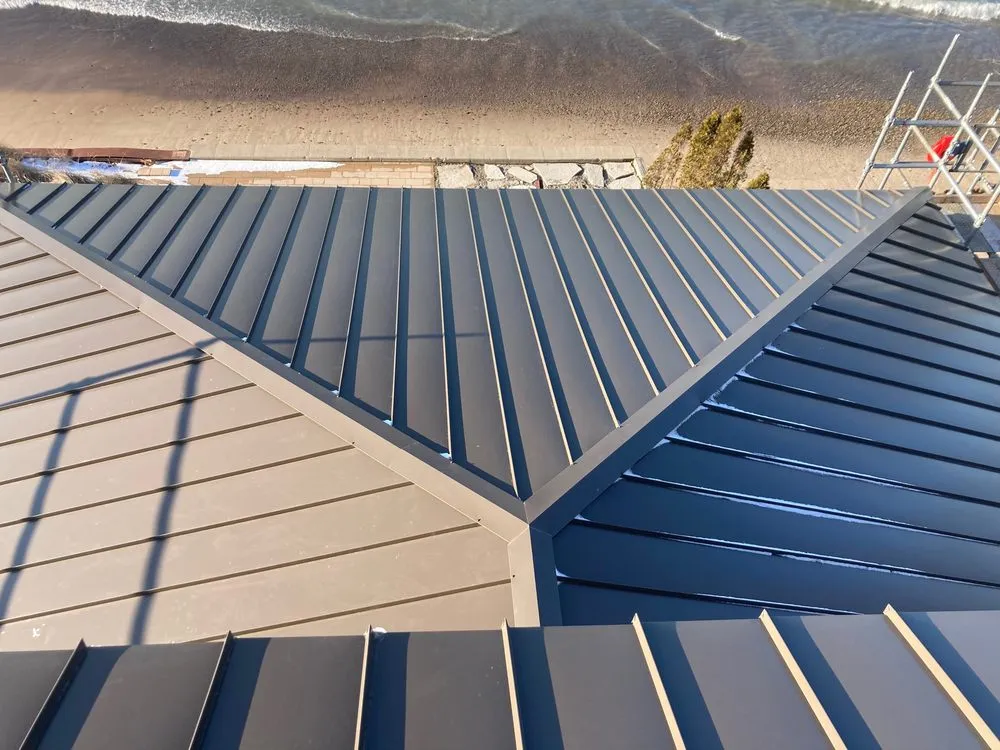 Slide of Mougin Roofing