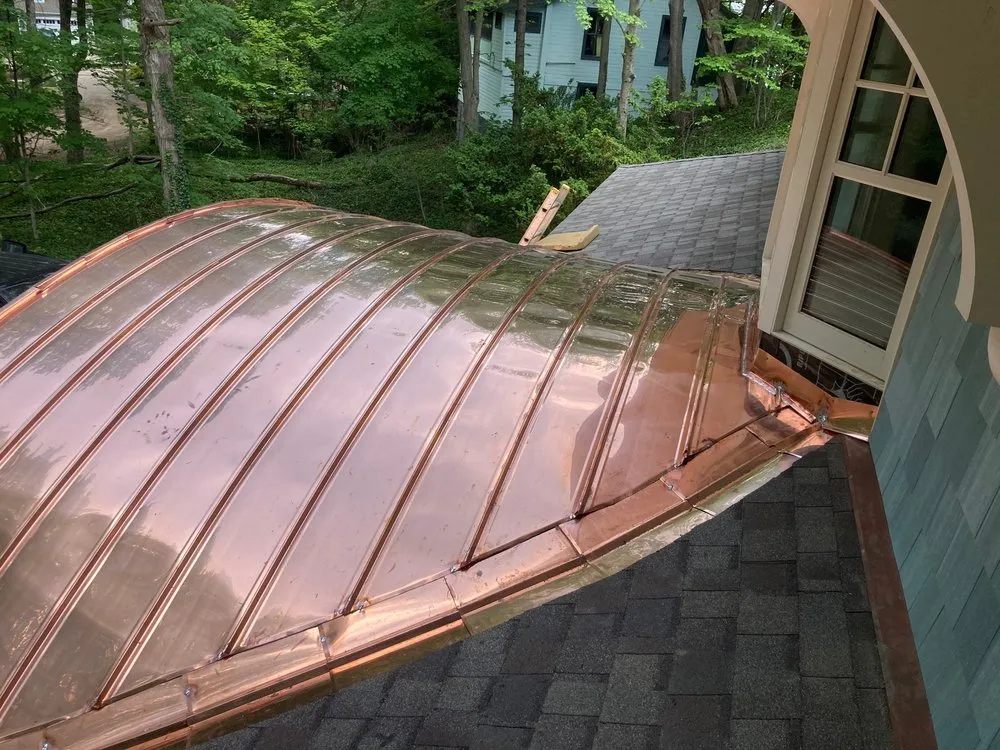 Slide of Mougin Roofing