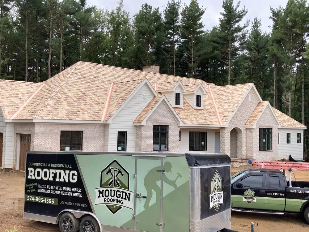 Slide of Mougin Roofing