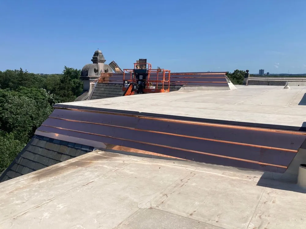 Slide of Mougin Roofing