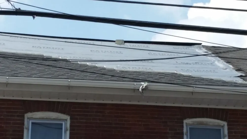 Slide of Mount Joy Roofing