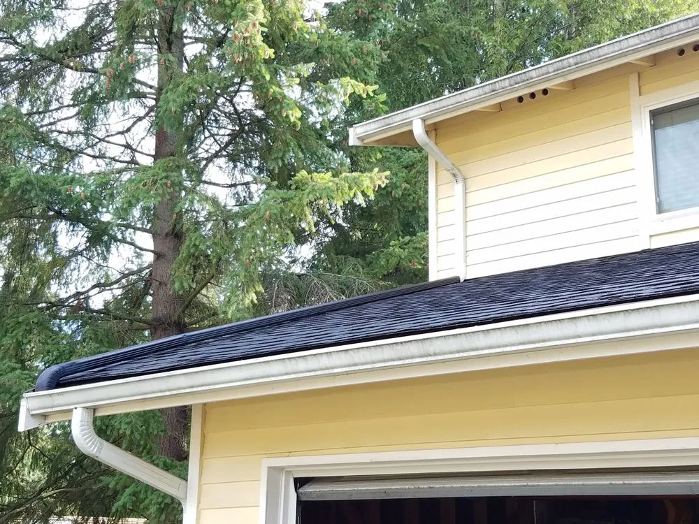 Slide of Mountain Goat Roofing