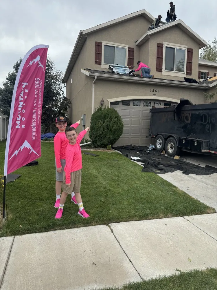 Slide of Mountain Roofers