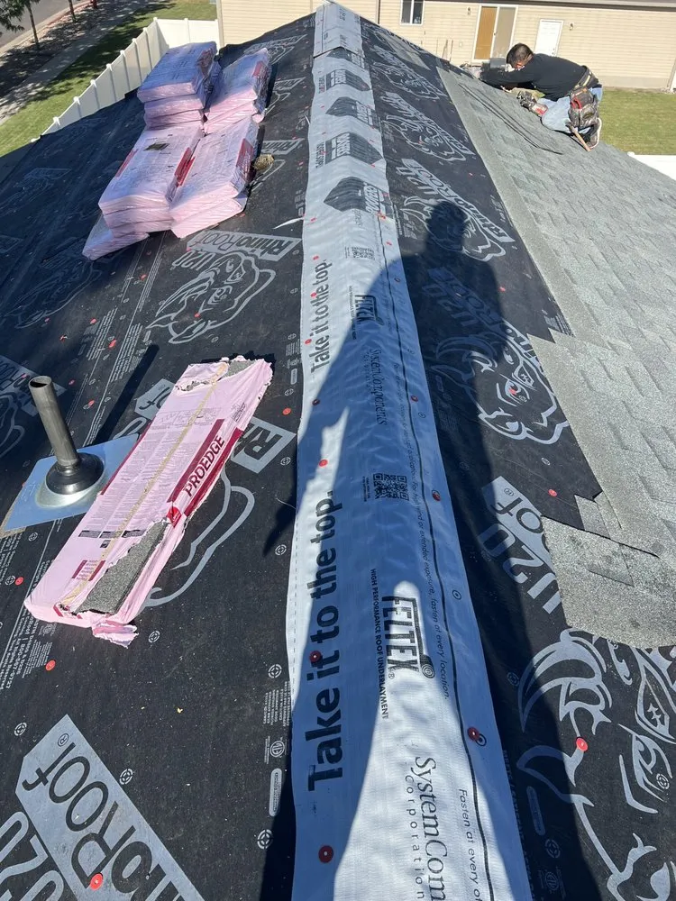 Slide of Mountain Roofers