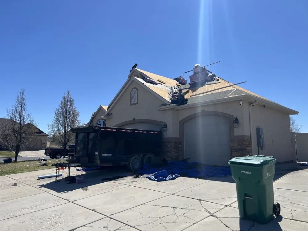 Slide of Mountain Roofers