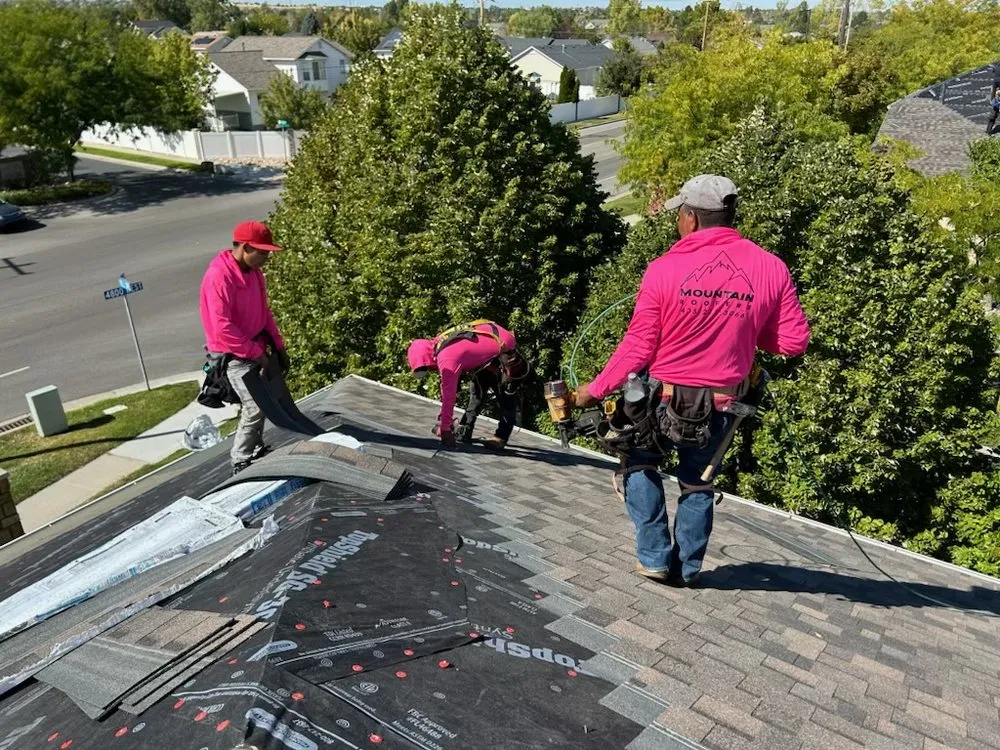 Slide of Mountain Roofers