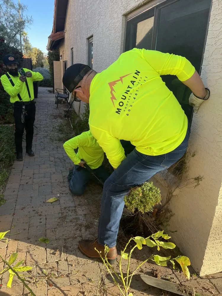 Slide of Mountain Roofers
