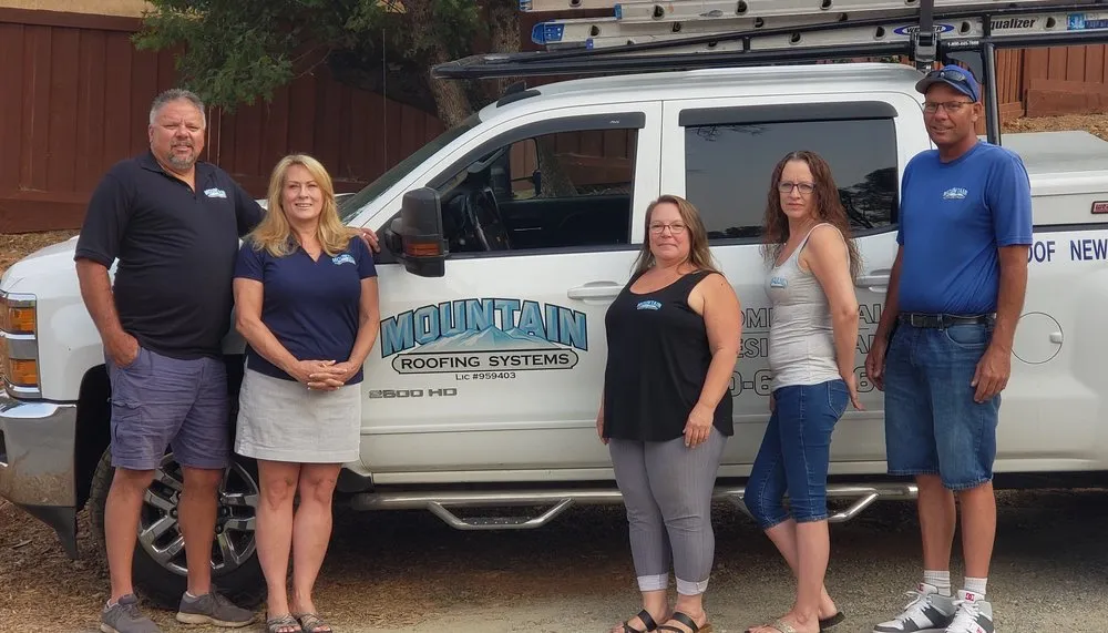 Slide of Mountain Roofing Systems