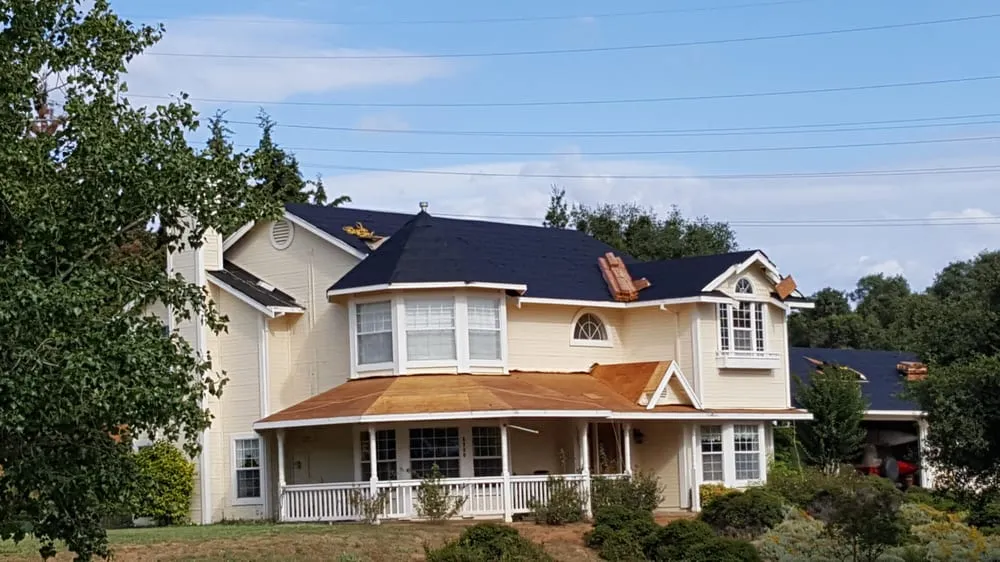 Slide of Mountain Roofing Systems