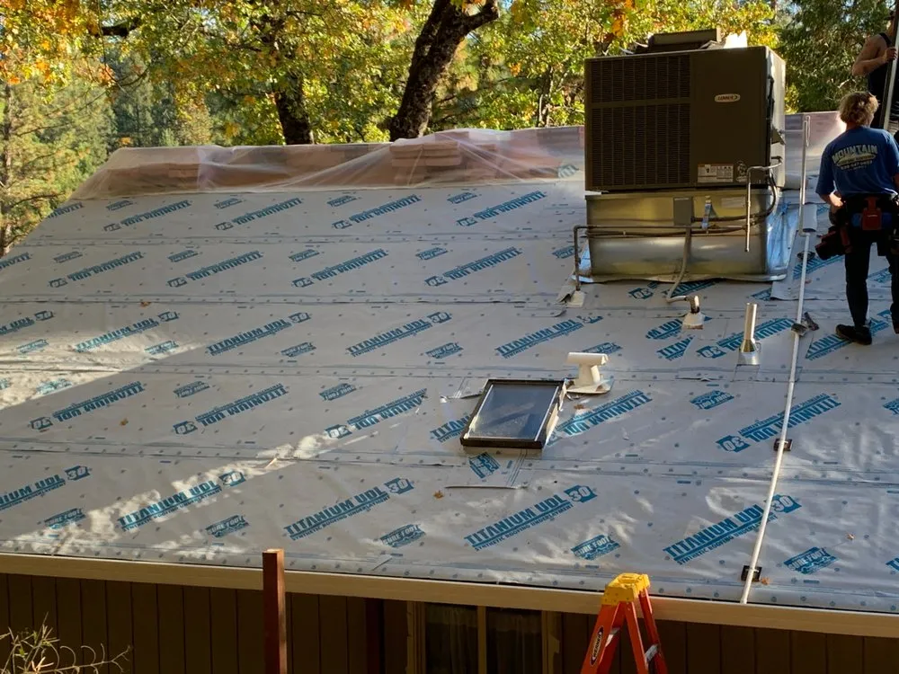 Slide of Mountain Roofing Systems