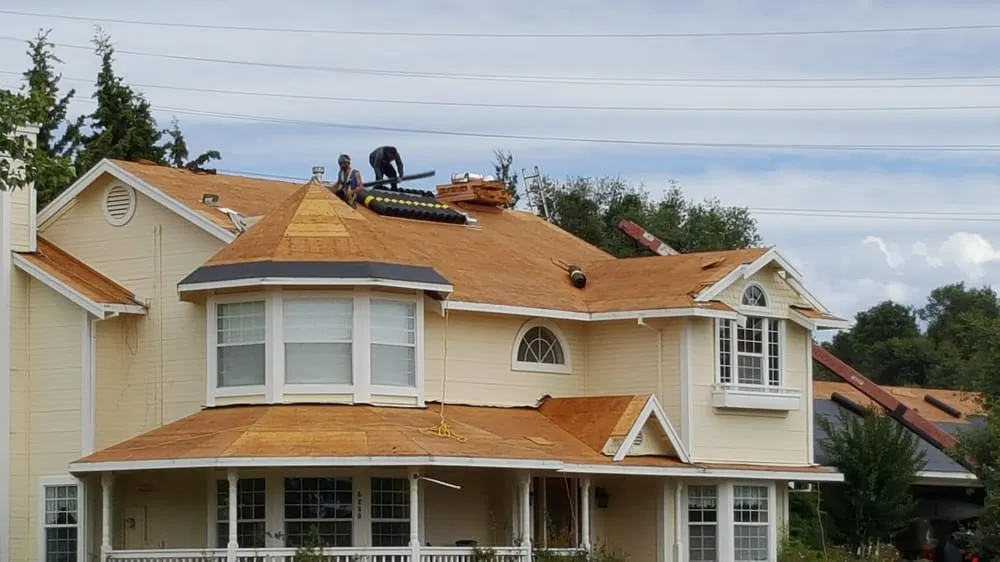 Slide of Mountain Roofing Systems