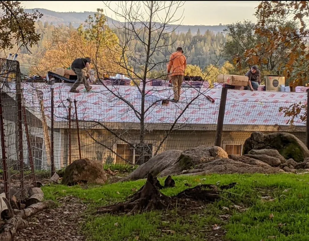 Slide of Mountain Roofing Systems