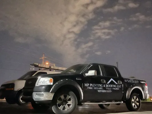 MP Painting And Roofing Logo