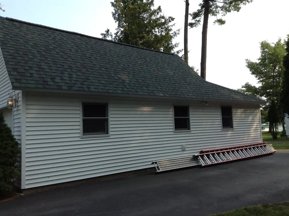 Reliable roof repair after storm damage in Benzonia, MI by Mr. B's Roofing & Siding