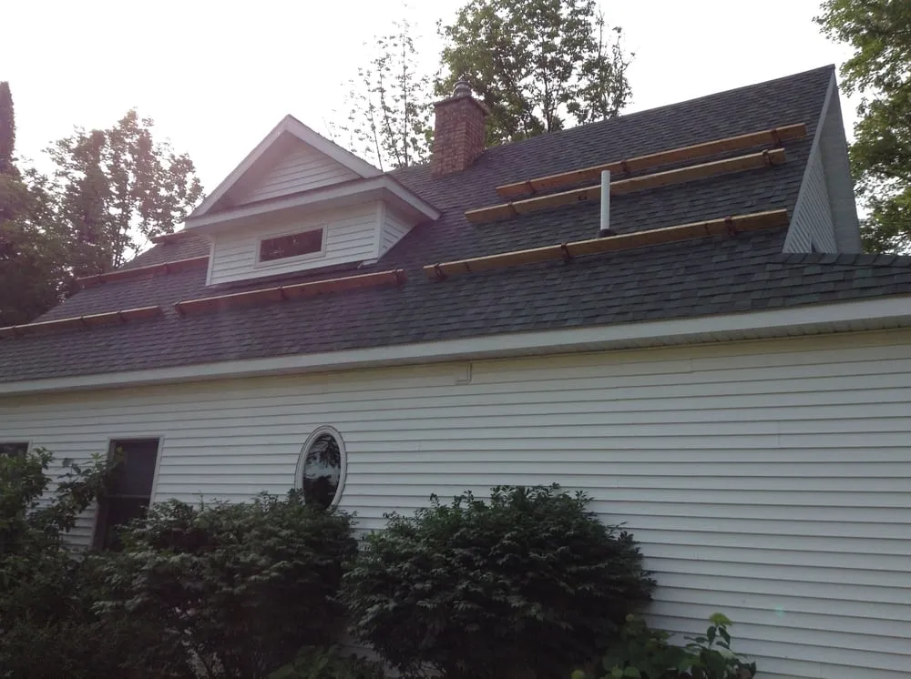Local roof leak repair same-day service in Benzonia, MI by Mr. B's Roofing & Siding