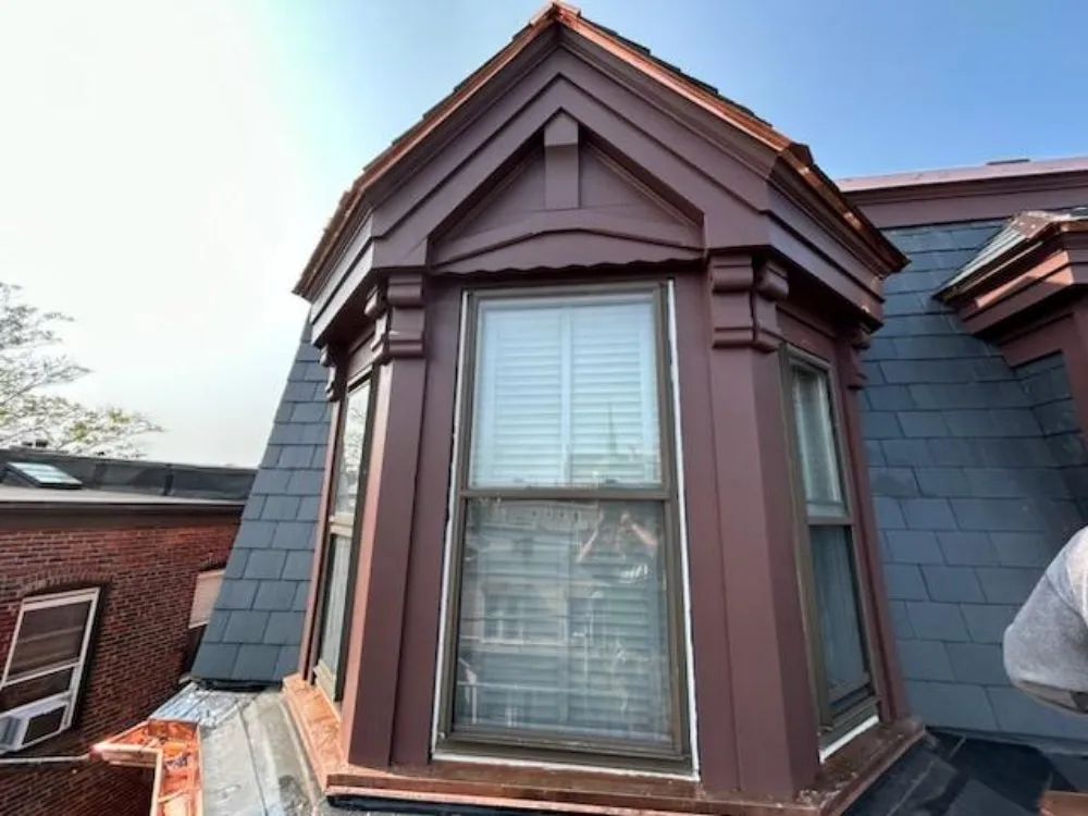 Slide of Mr Iceman Co Roofing