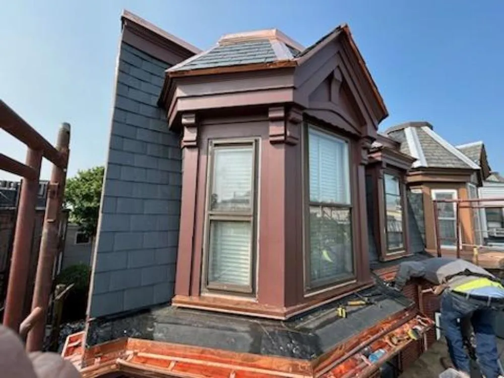 Slide of Mr Iceman Co Roofing