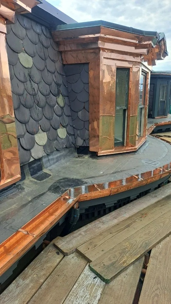 Slide of Mr Iceman Co Roofing