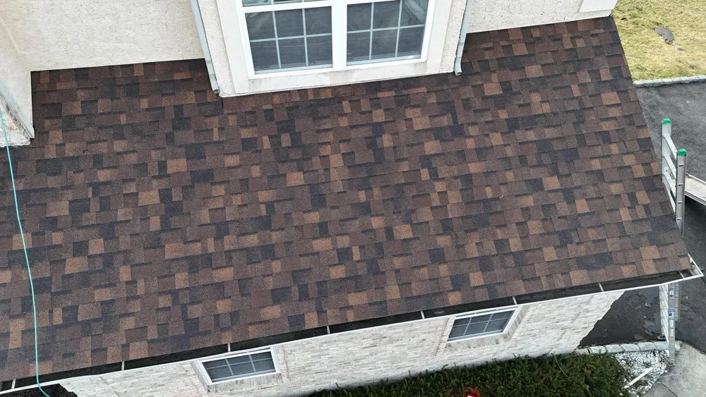 Slide of M&R Roofing