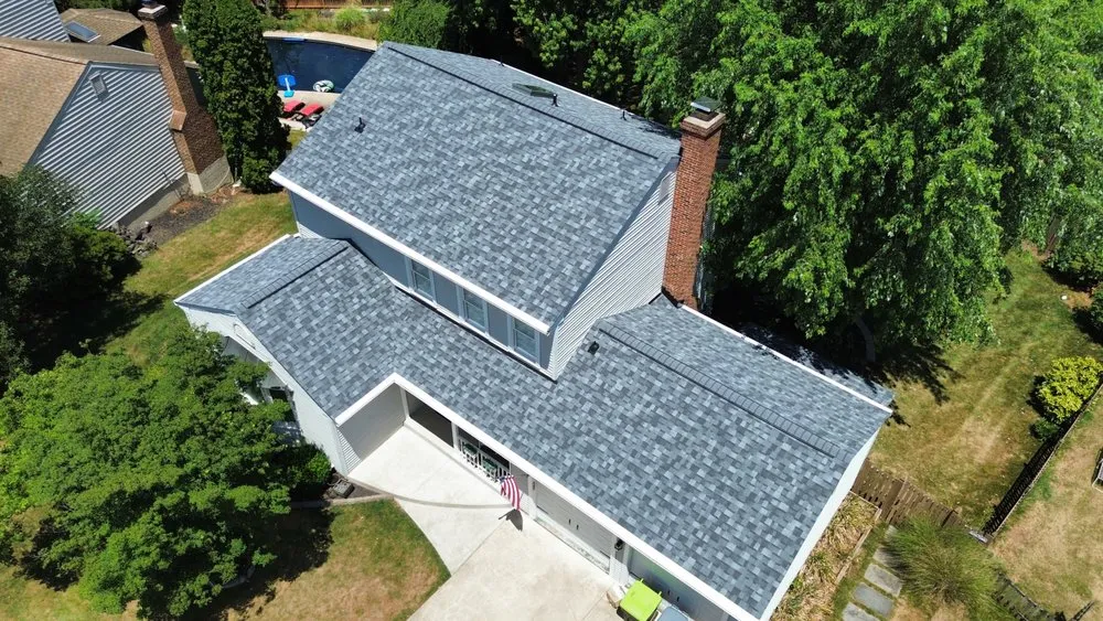 Slide of MRA Roofing & Restoration