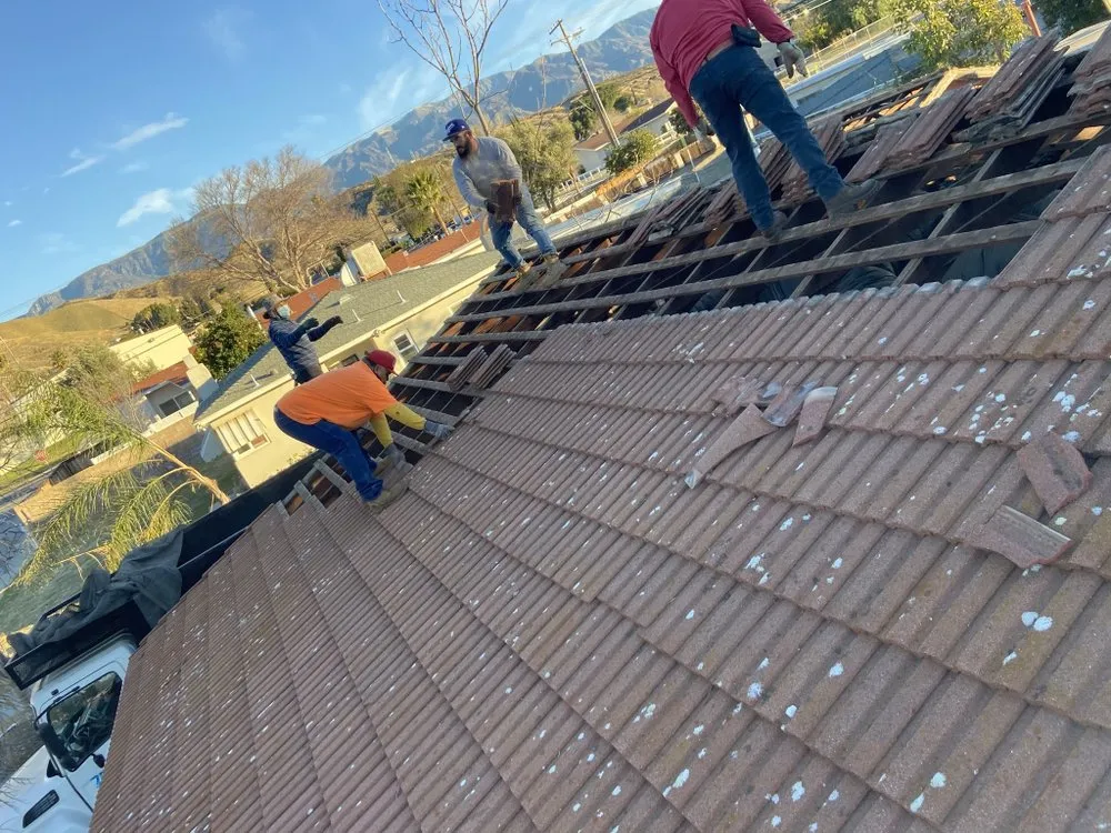 Slide of MRK Roofing Services