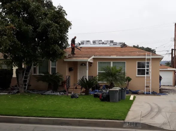 Slide of MRK Roofing Services