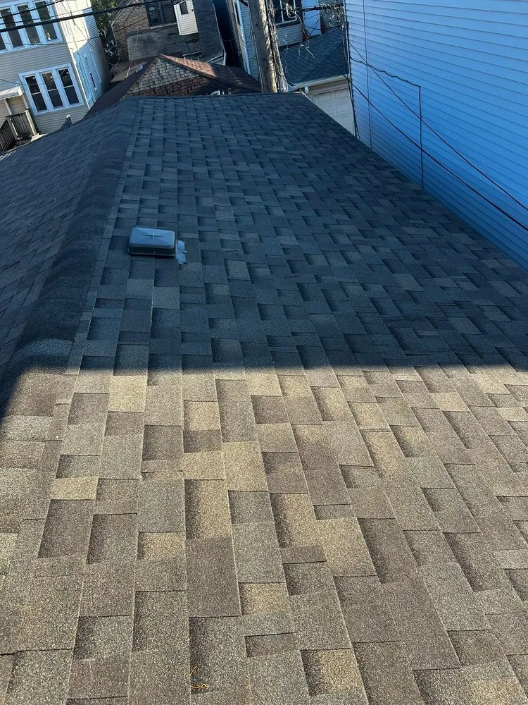 Slide of MRM Restoration Roofing & Seamless gutters