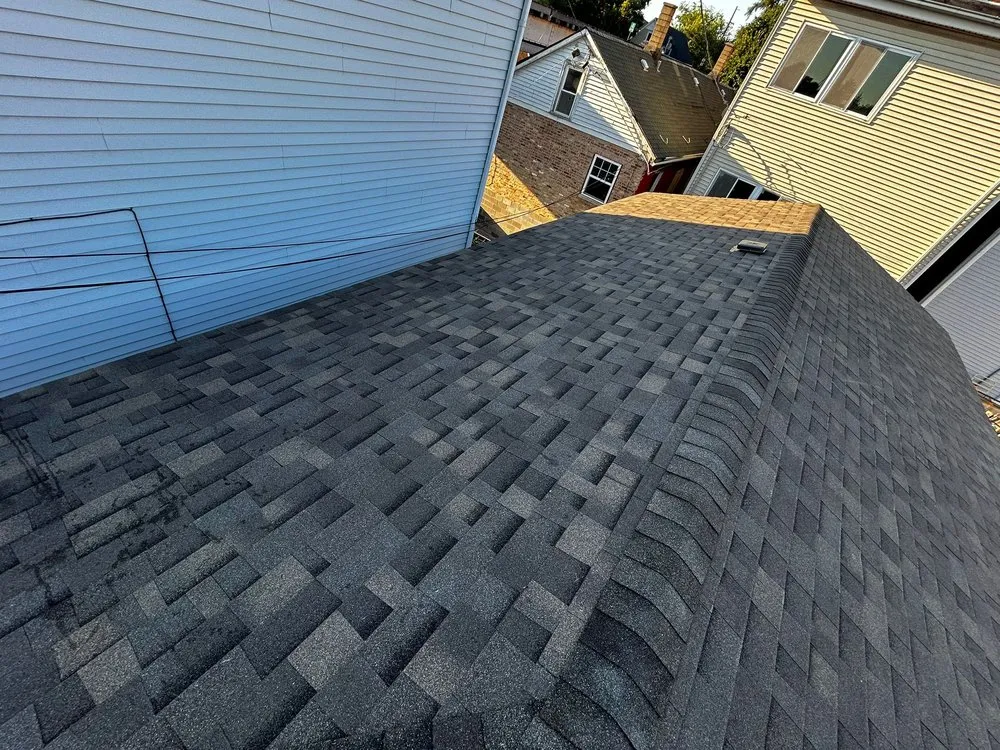 Slide of MRM Restoration Roofing & Seamless gutters