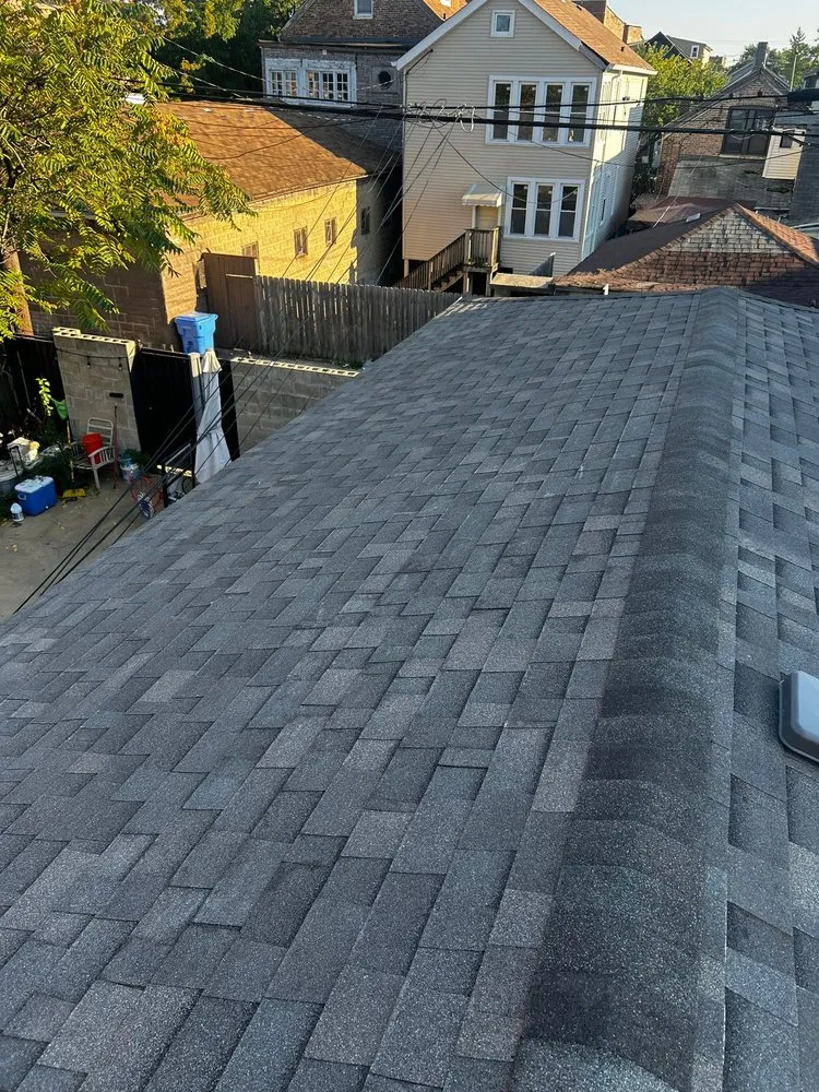 Slide of MRM Restoration Roofing & Seamless gutters