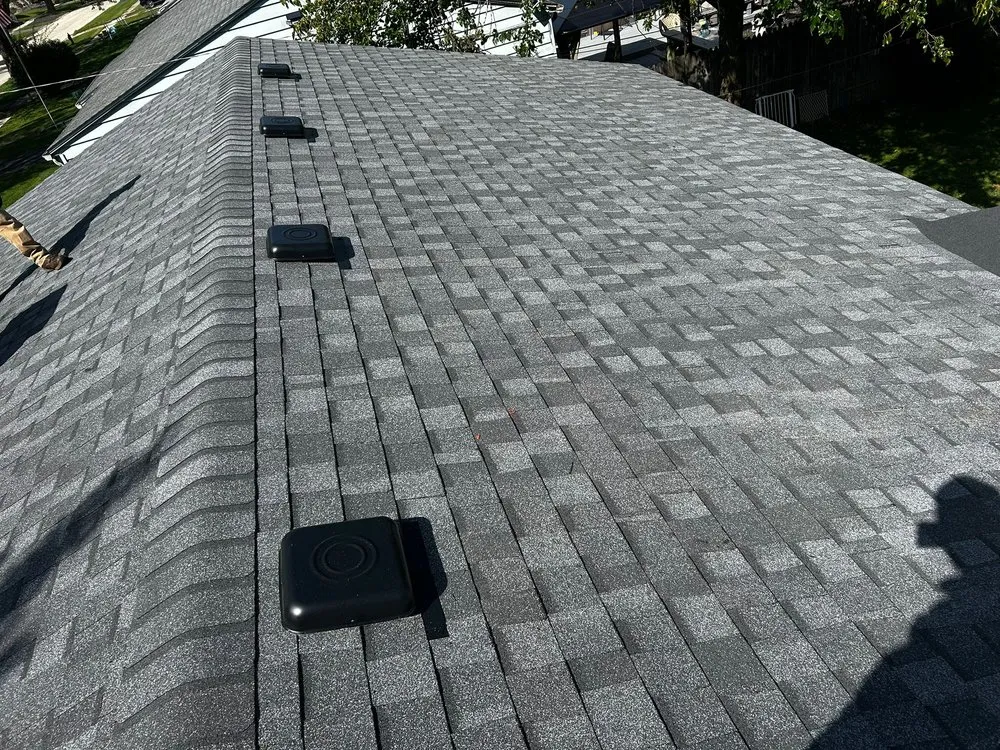 Slide of MRM Restoration Roofing & Seamless gutters