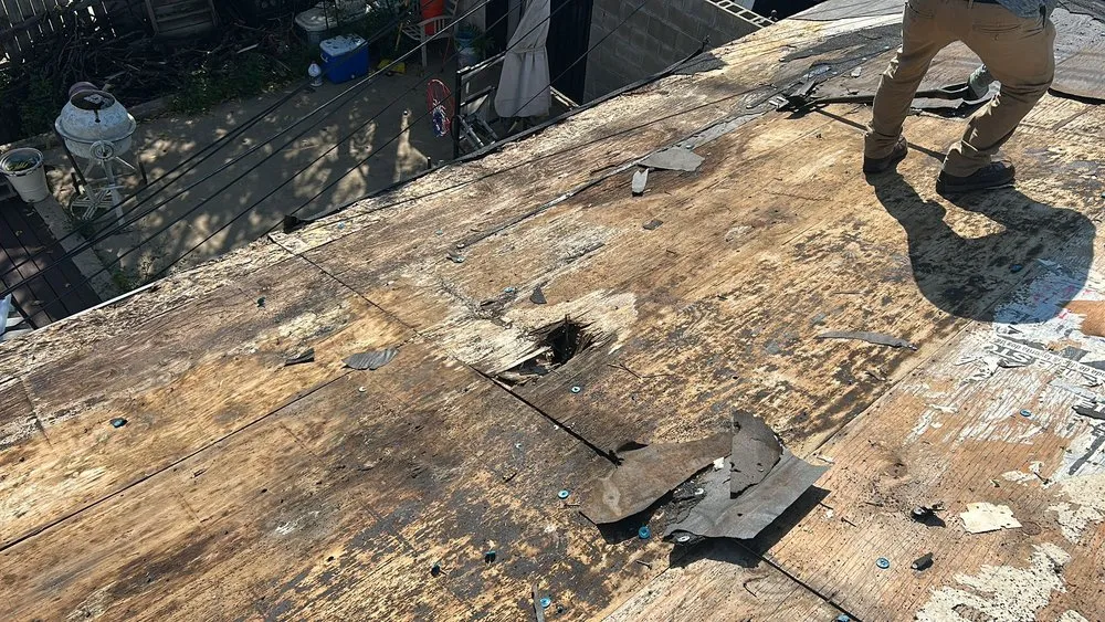 Slide of MRM Restoration Roofing & Seamless gutters