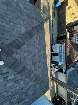 MRM Restoration Roofing & Seamless gutters Logo